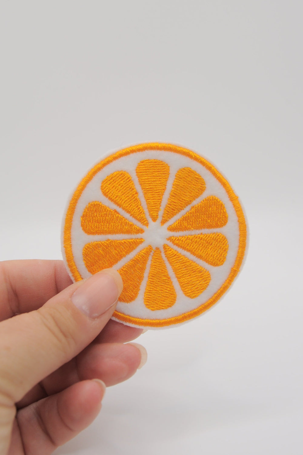 Patch im Form eine Orangenscheibe