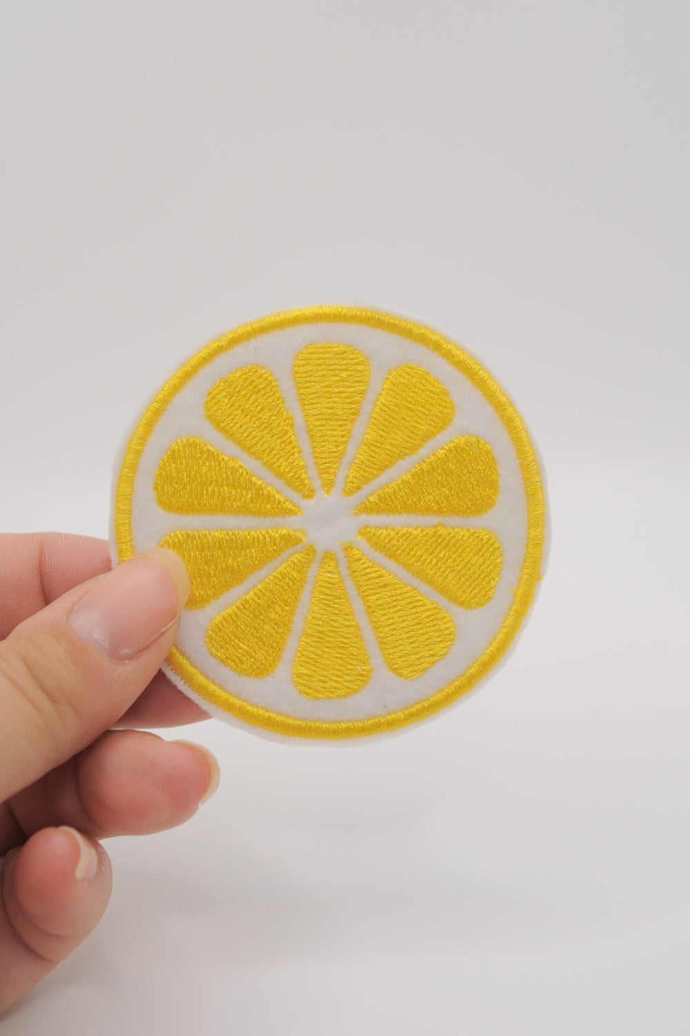 Patch im Form eine Zitronenscheibe