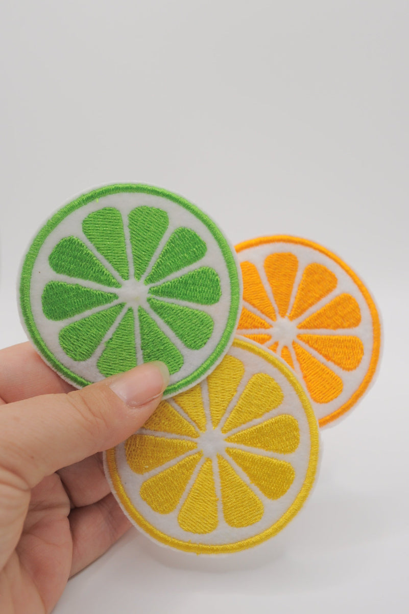 Patch im Form eine Zitrusscheibe, Limette, Orange oder Zitrone