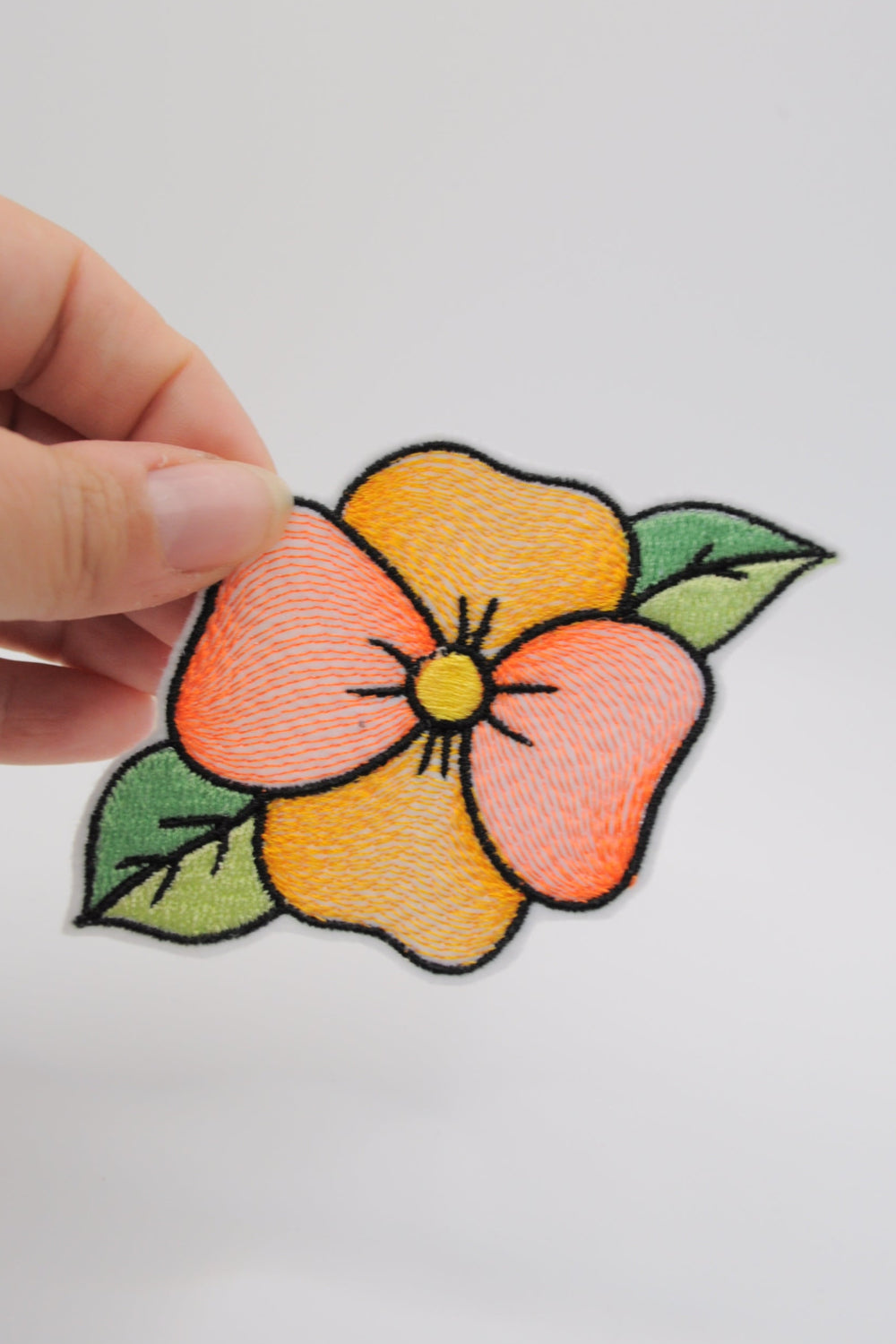 Flicken in Form eine Blume, orange klein