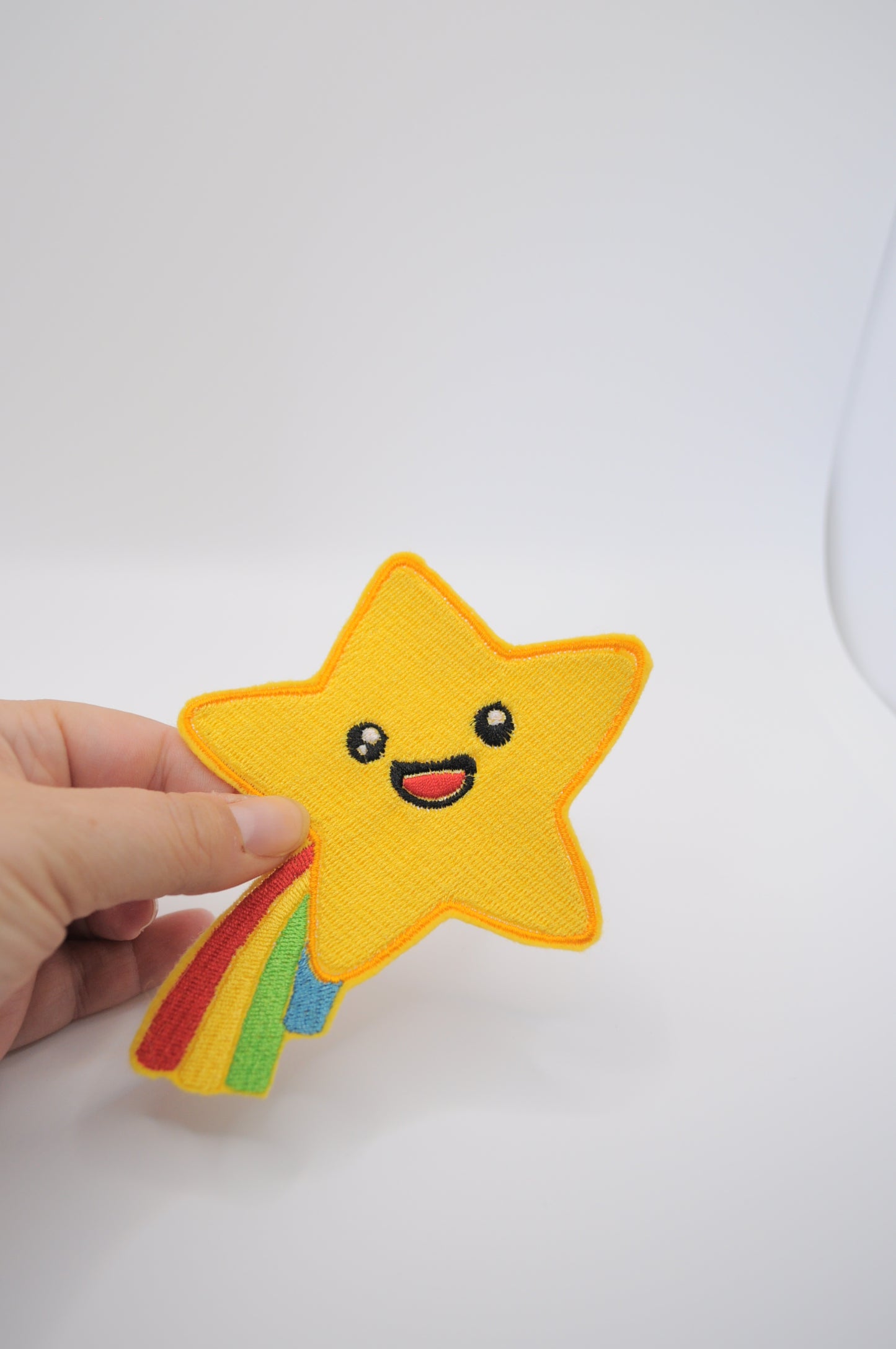 Flicken oder Patch Sternschnuppe mit Regenbogen