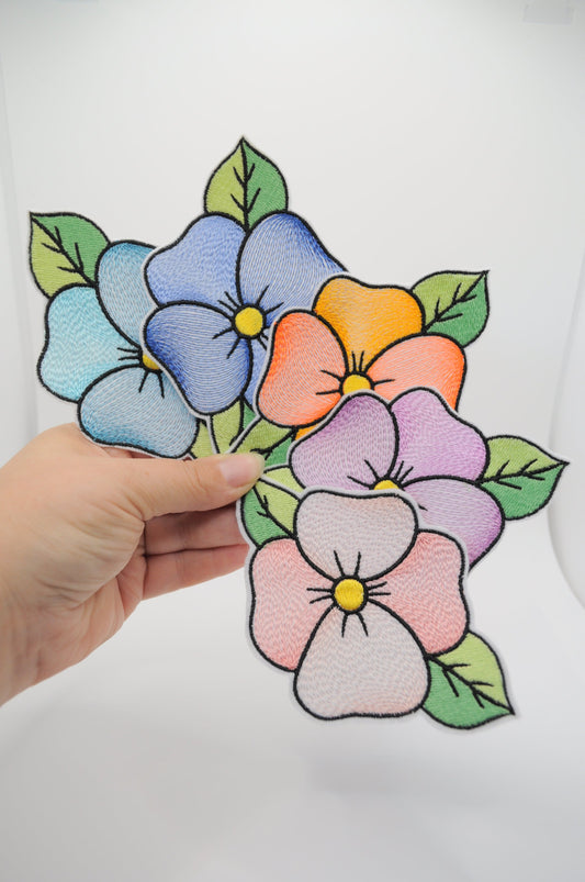 Flicken in Form eine Vierblätterige Blume mit grüne Blätter. 5 Farbvarianten